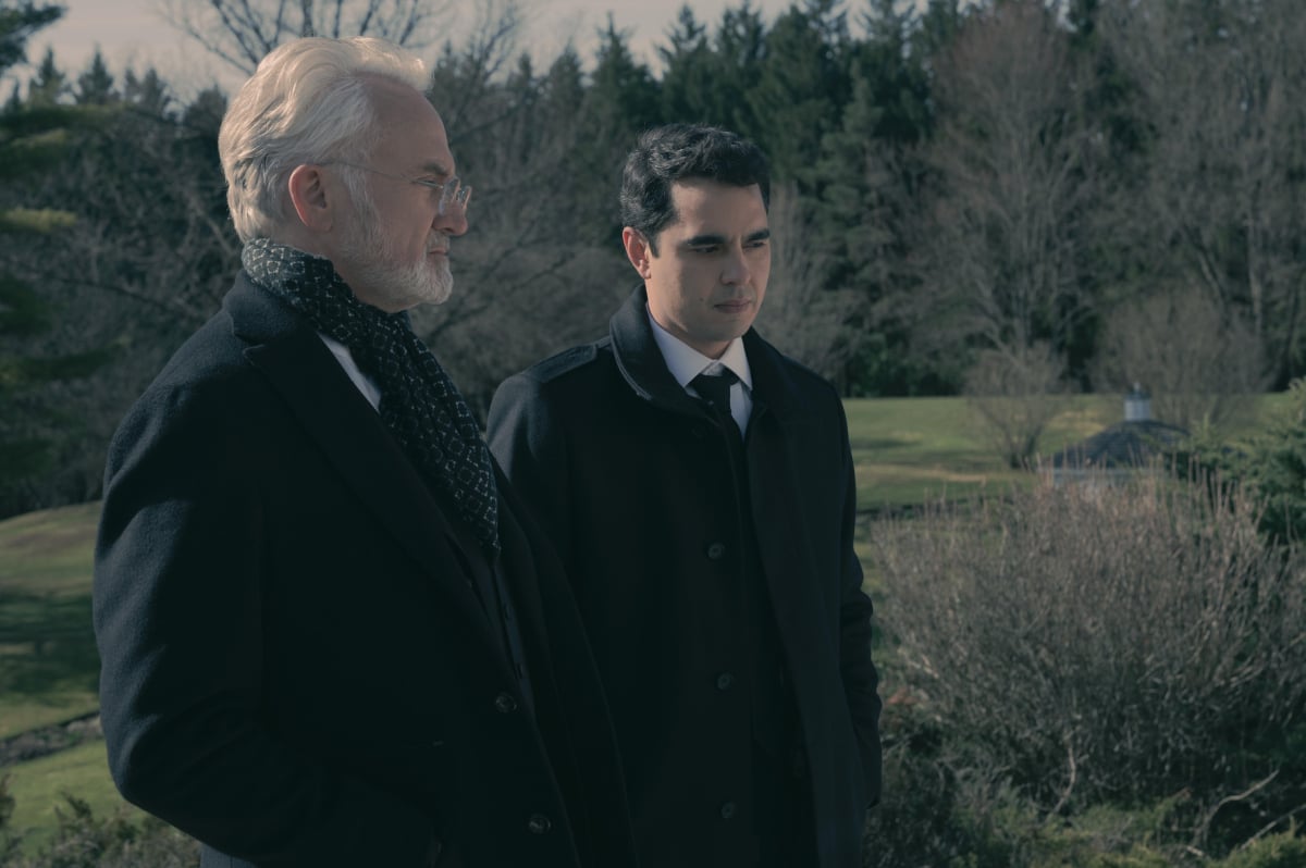 In The Handmaid's Tale Season 5 Nick and Commander Lawrence stand outside together.