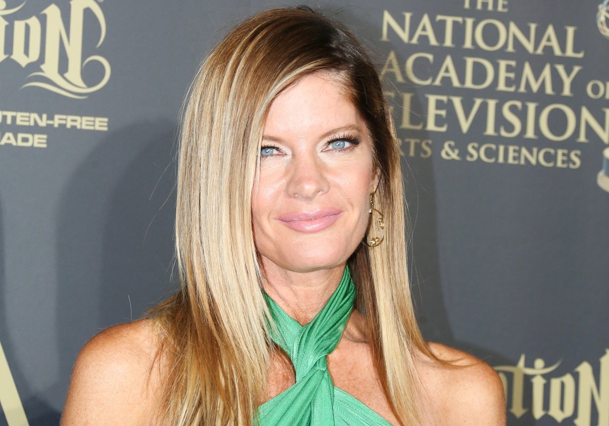 'The Young and the Restless' star Michelle Stafford wearing a green dress and posing on the red carpet.