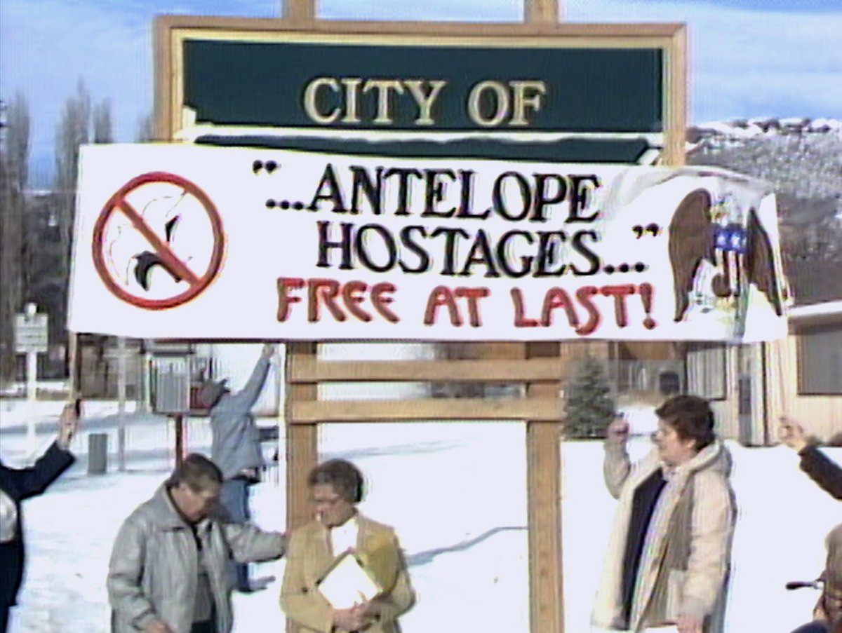 A sign reading 'City of ... antelope hostages... free at last!'