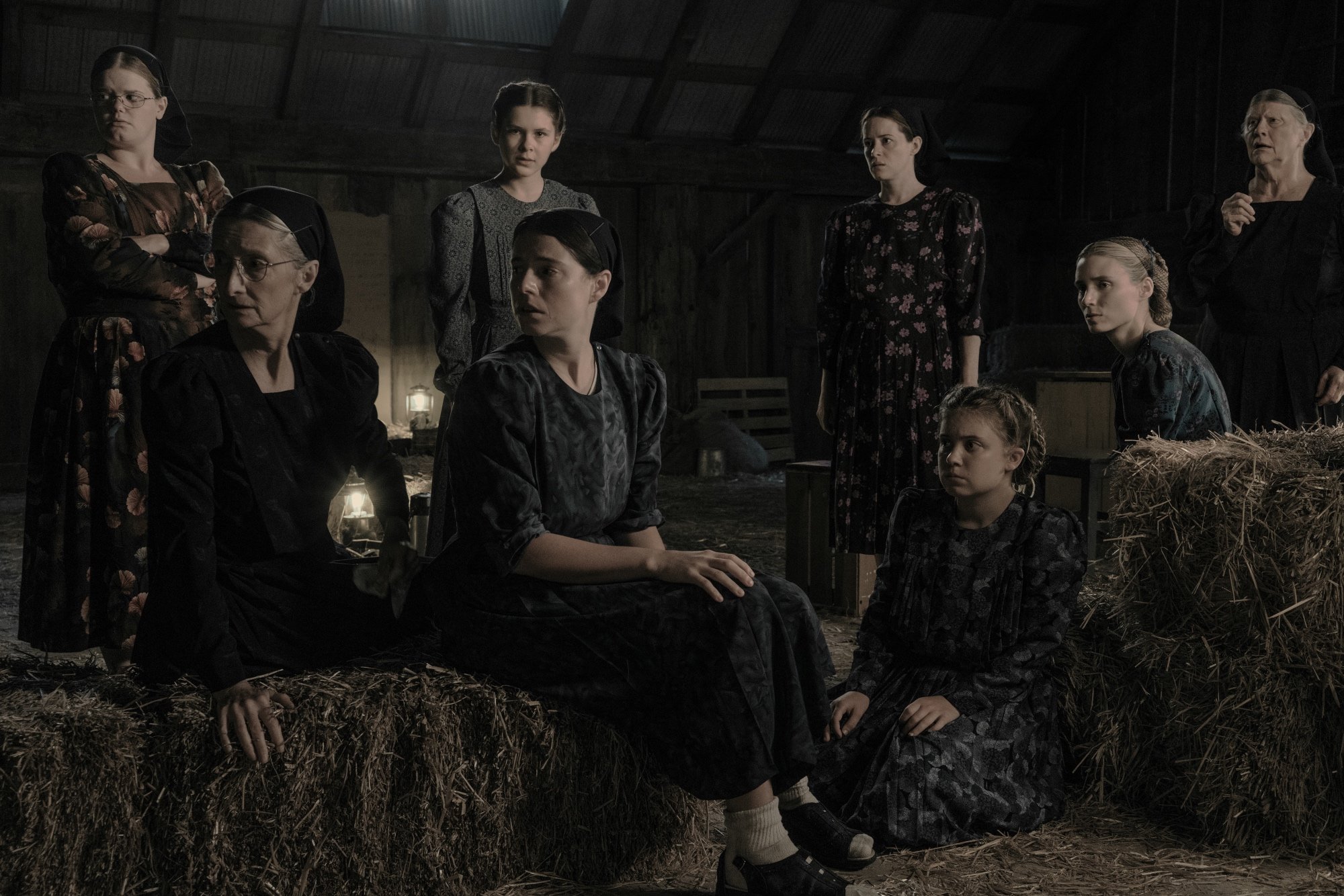 'Women Talking' Michelle McLeod stars as Mejal, Sheila McCarthy as Greta, Liv McNeil as Neitje, Jessie Buckley as Mariche, Claire Foy as Salome, Kate Hallett as Autje, Rooney Mara as Ona and Judith Ivey as Agata in a barn sitting around haystacks looking surprised