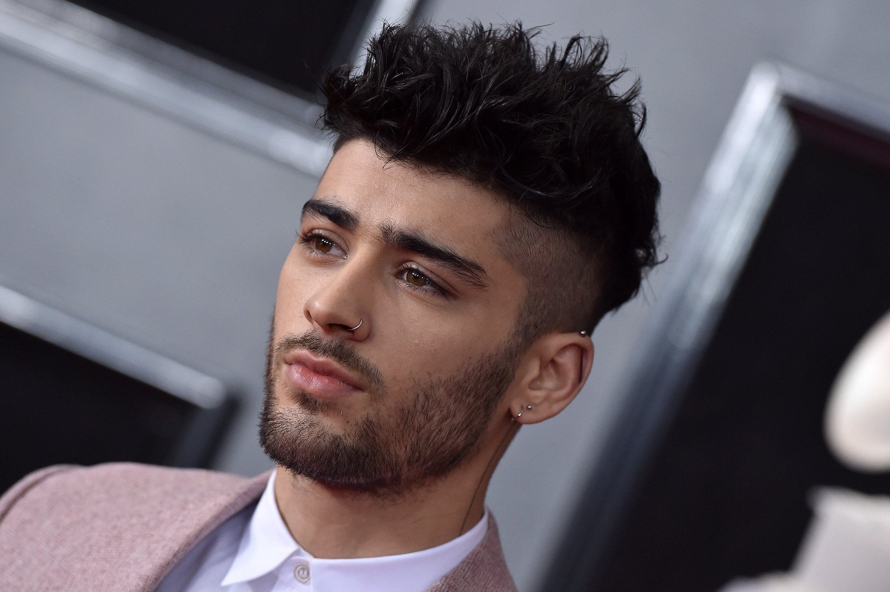 Zayn Malik, who incorporated Jimi Hendrix's song 'Angel' in his new music, posing for a photo