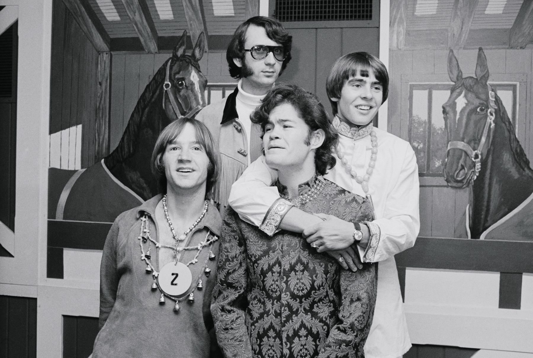 The Monkees Hit Town, posing for a photographer at their hotel after arriving in New York