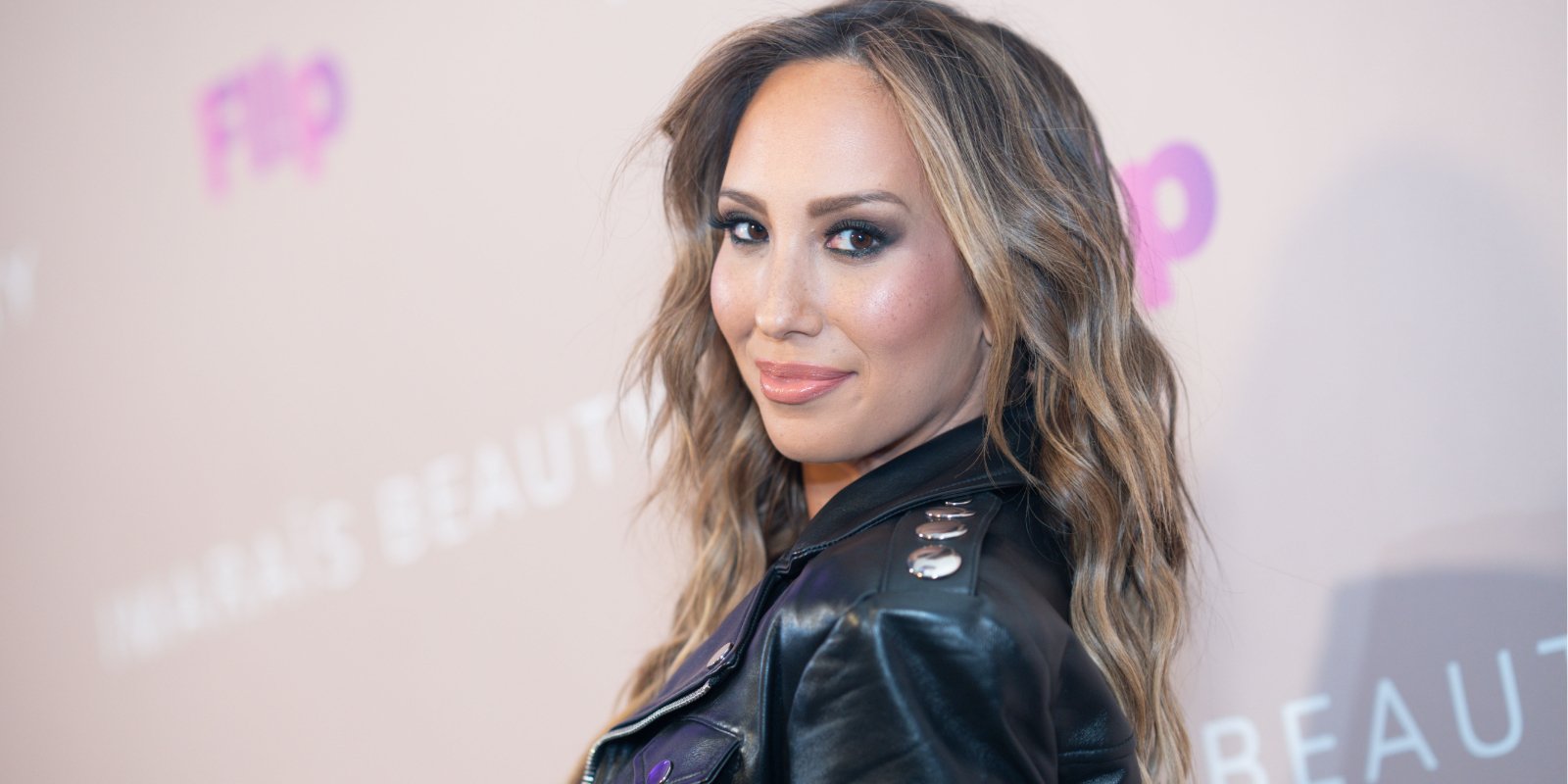 'Dancing with the Stars' pro Cheryl Burke poses at a red carpet event in early November 2022.