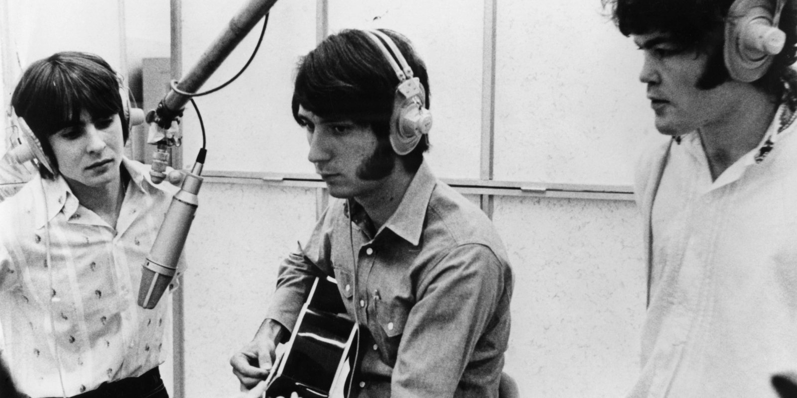 The Monkees band members avy Jones, Mike Nesmith and Micky Dolenz in the recording studio.