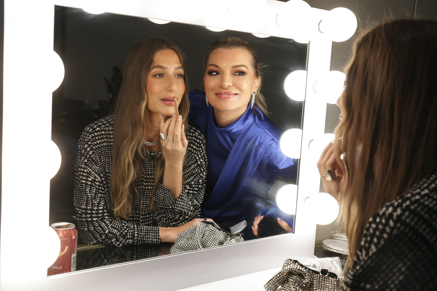 Amanda Batula, Lindsay Hubbard from 'Summer House' apply lipstick at BravoCon