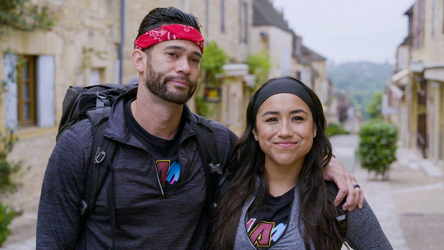 Luis Colon and Michelle Burgos pose together on The Amazing Race Season 34
