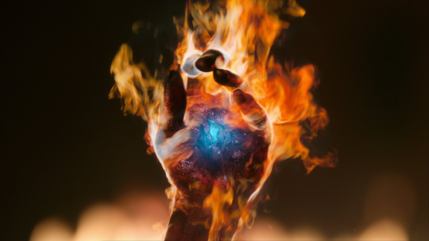 A hand on fire with sapphire in its palm in Manifest Season 4 on Netflix