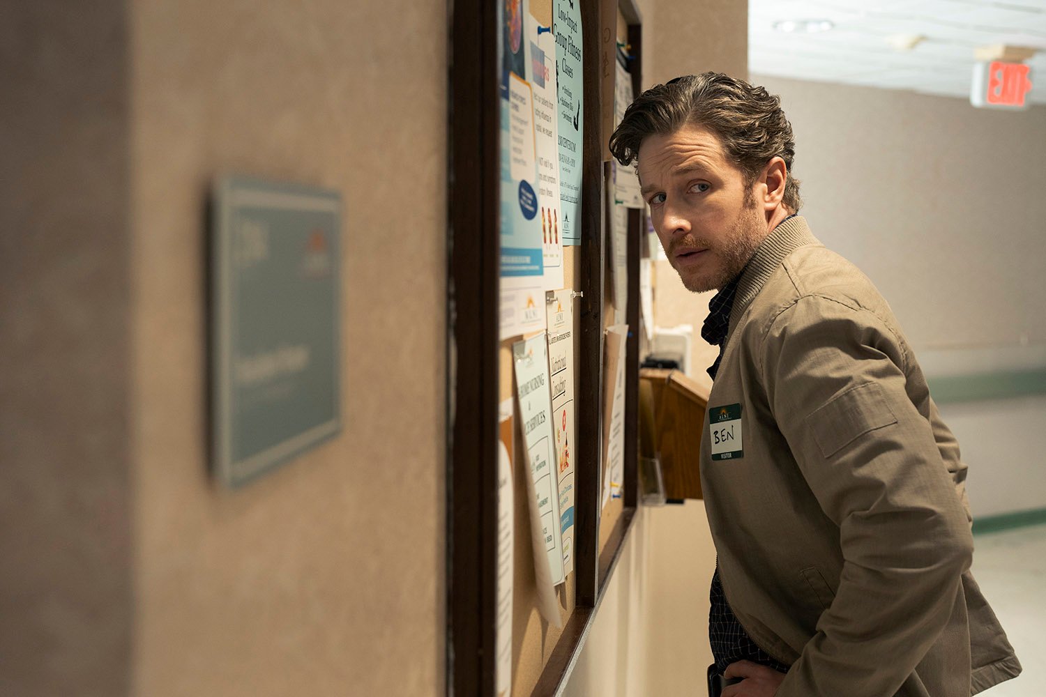 Josh Dallas as Ben Stone standing in front of a bulletin board in Manifest Season 4 Episode 7.