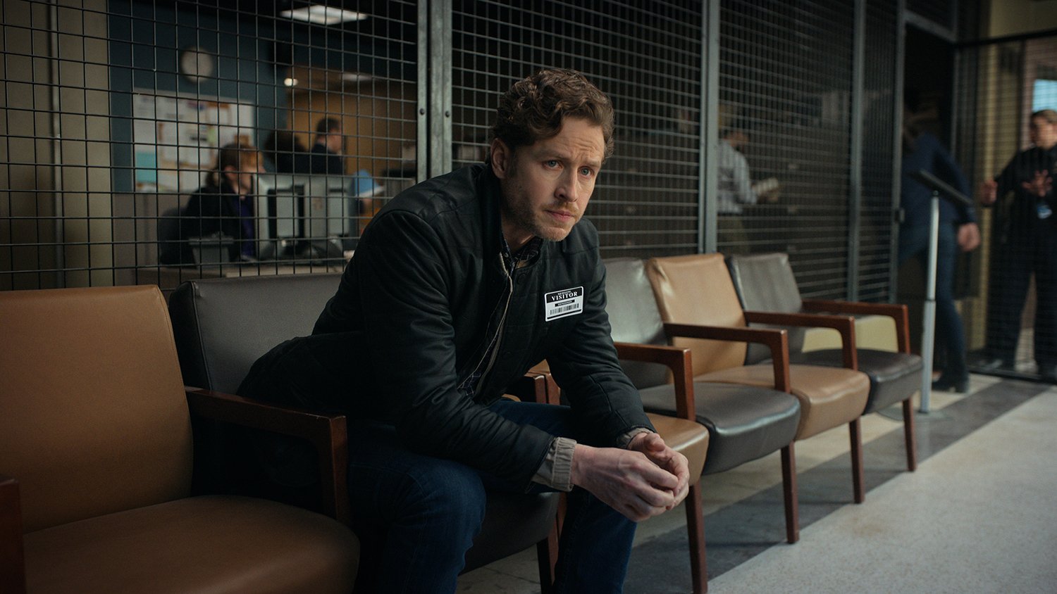 Josh Dallas as Ben Stone sitting and looking pensive in Manifest Season 4