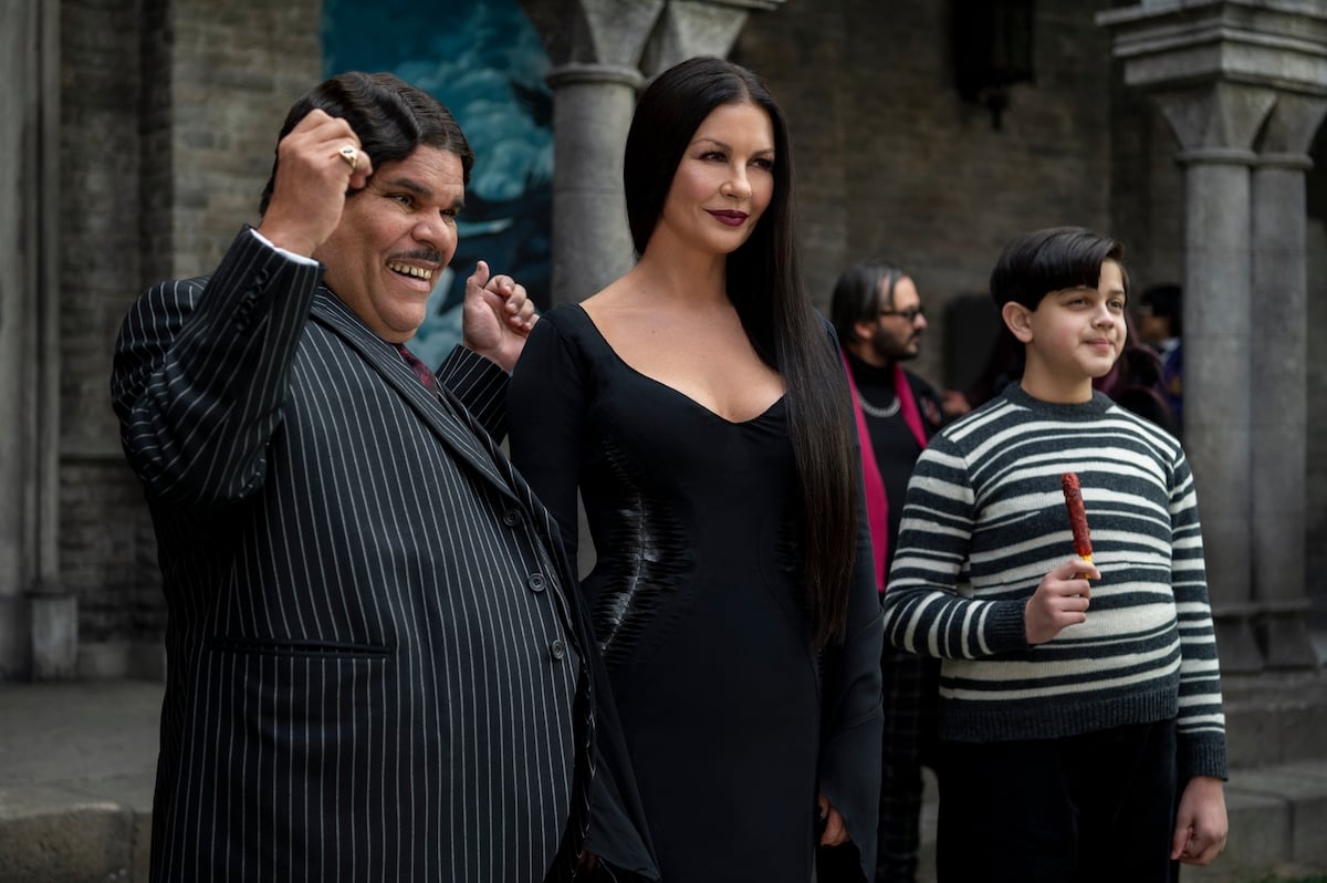 Luis Guzmán as Gomez Addams, Catherine Zeta-Jones as Morticia Addams, Issac Ordonez as Pugsley Addams in episode 5 of 'Wednesday'