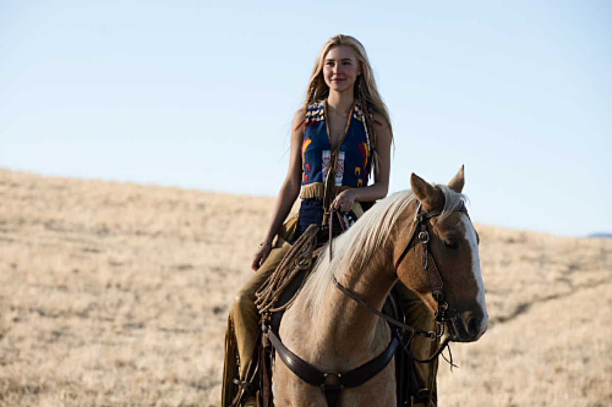 Is Isabel May's character Elsa Dutton the 1923 narrator? Elsa wear's Sam's Comanche vest and sits on top of her horse.