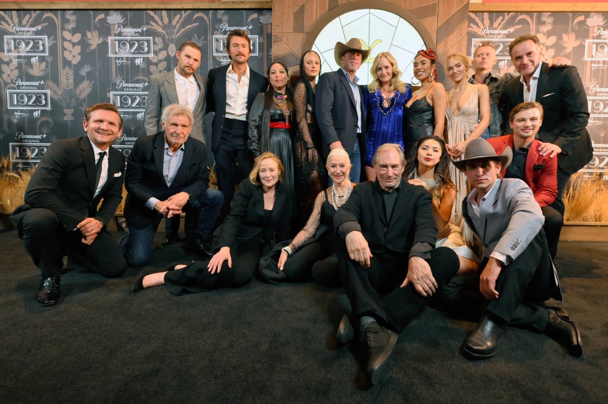 The cast of 1923 attended cowboy camp. Taylor Sheridan poses with the cast at 1923 Last Vegas premiere screening.