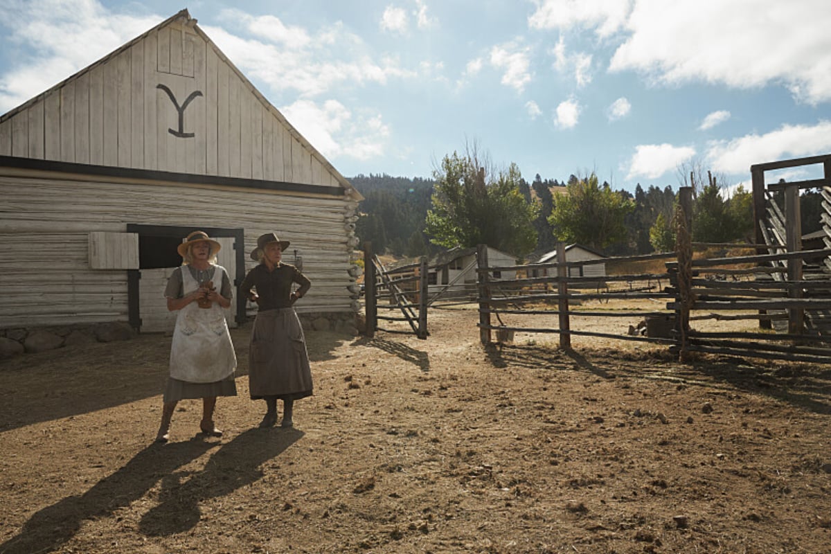 Montana was the primary filming location for 1923. Emma and Cara Dutton stand outside the Yellowstone barn.