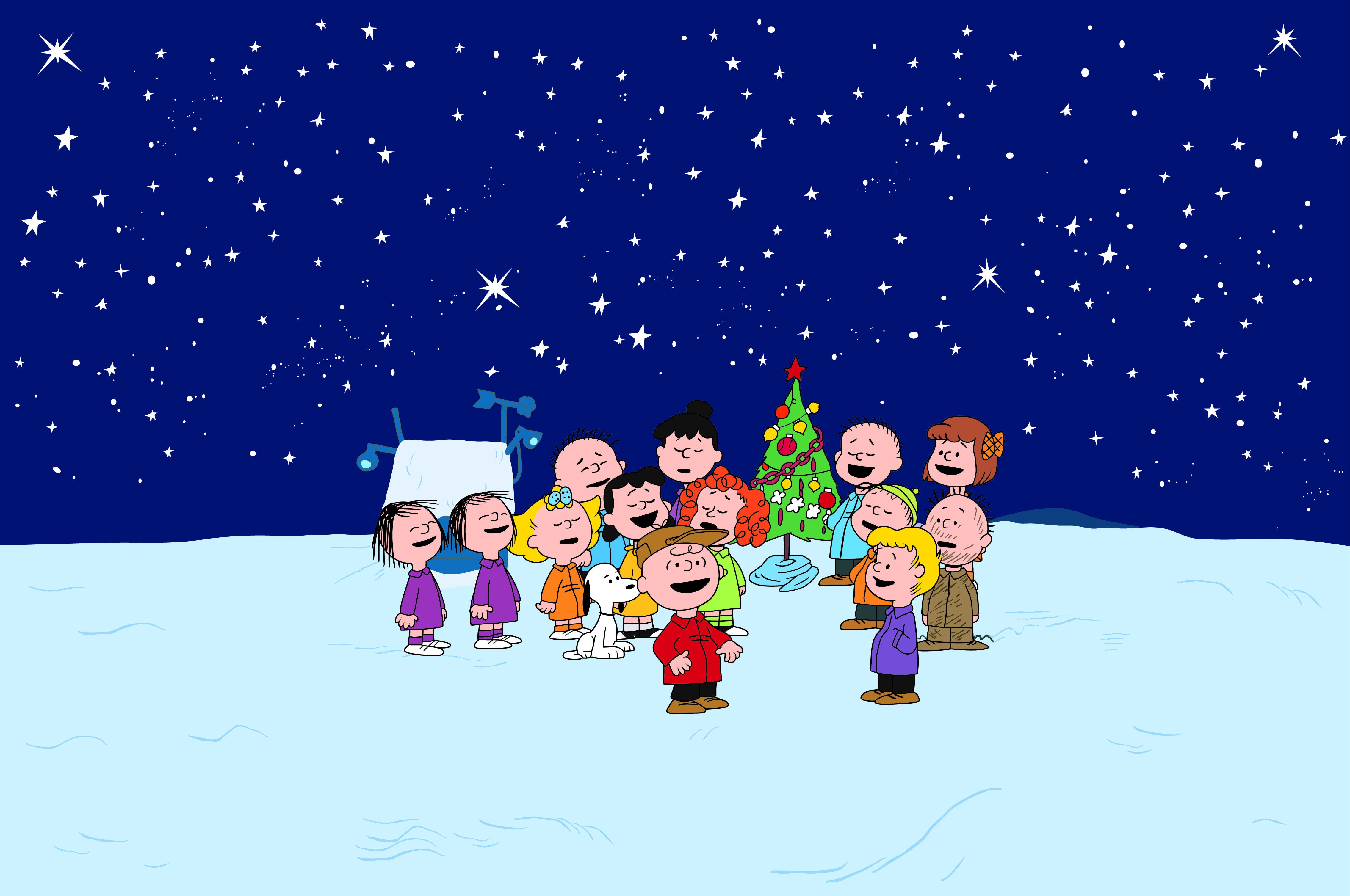 Scene of the Peanuts around the Christmas tree in 'A Charlie Brown Christmas'