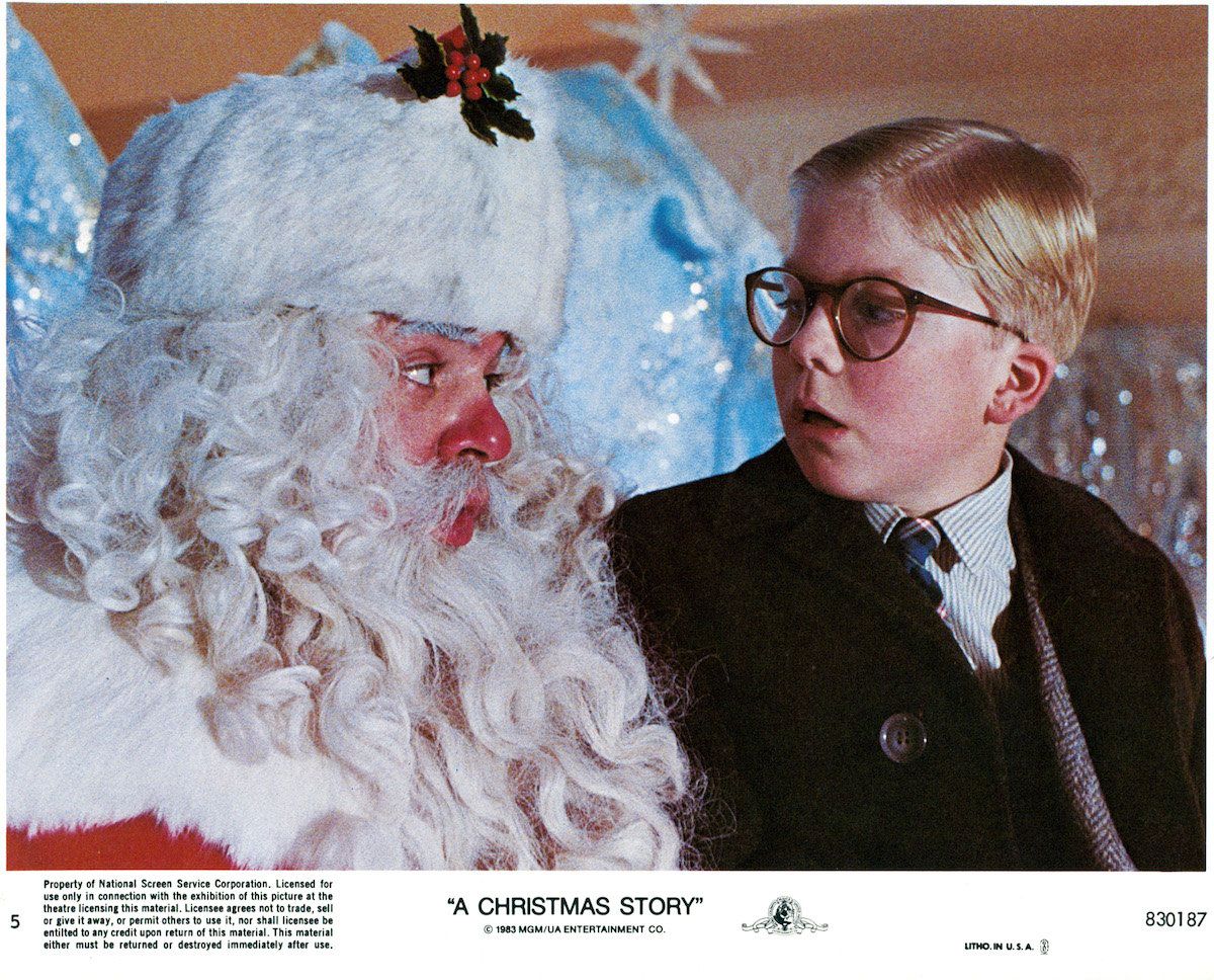 Actor Peter Billingsley sits on Santa's lap in a scene from the film A Christmas Story