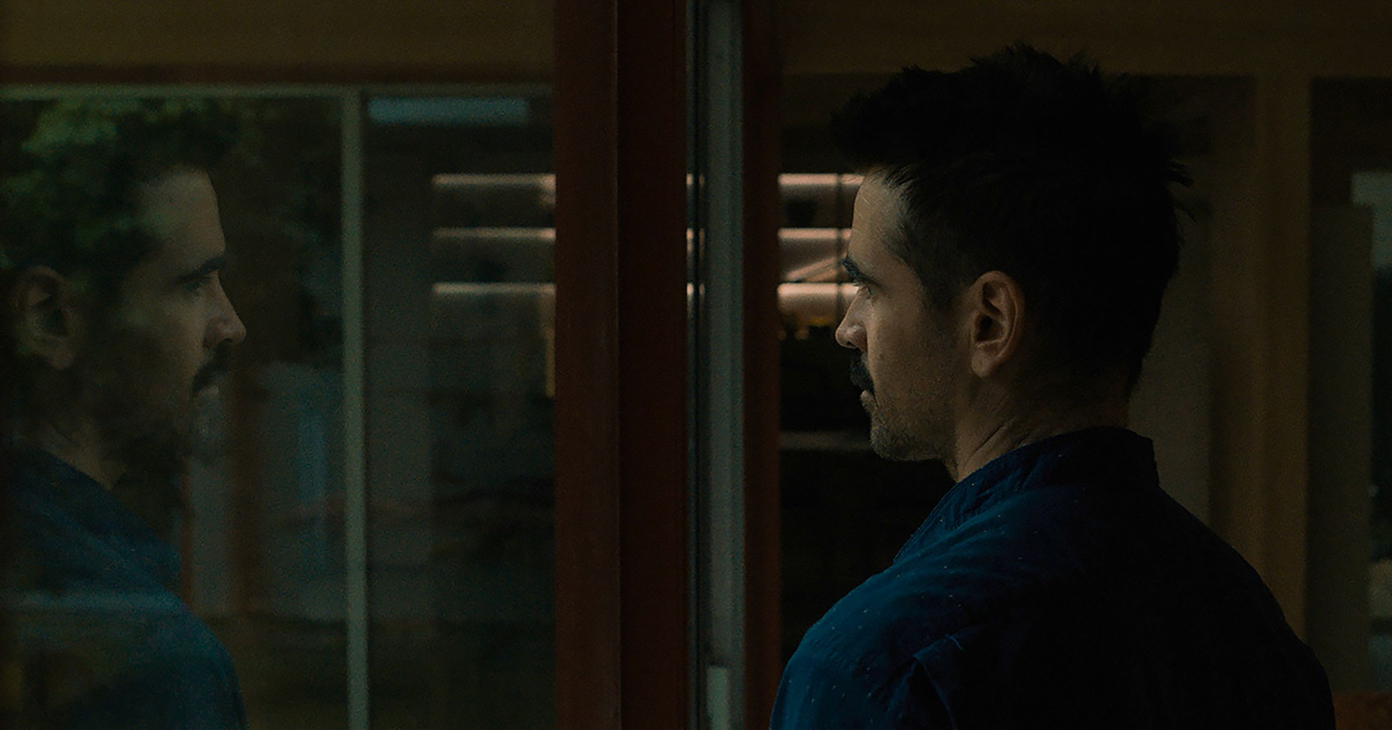 'After Yang' Colin Farrell as Jake looking out the window