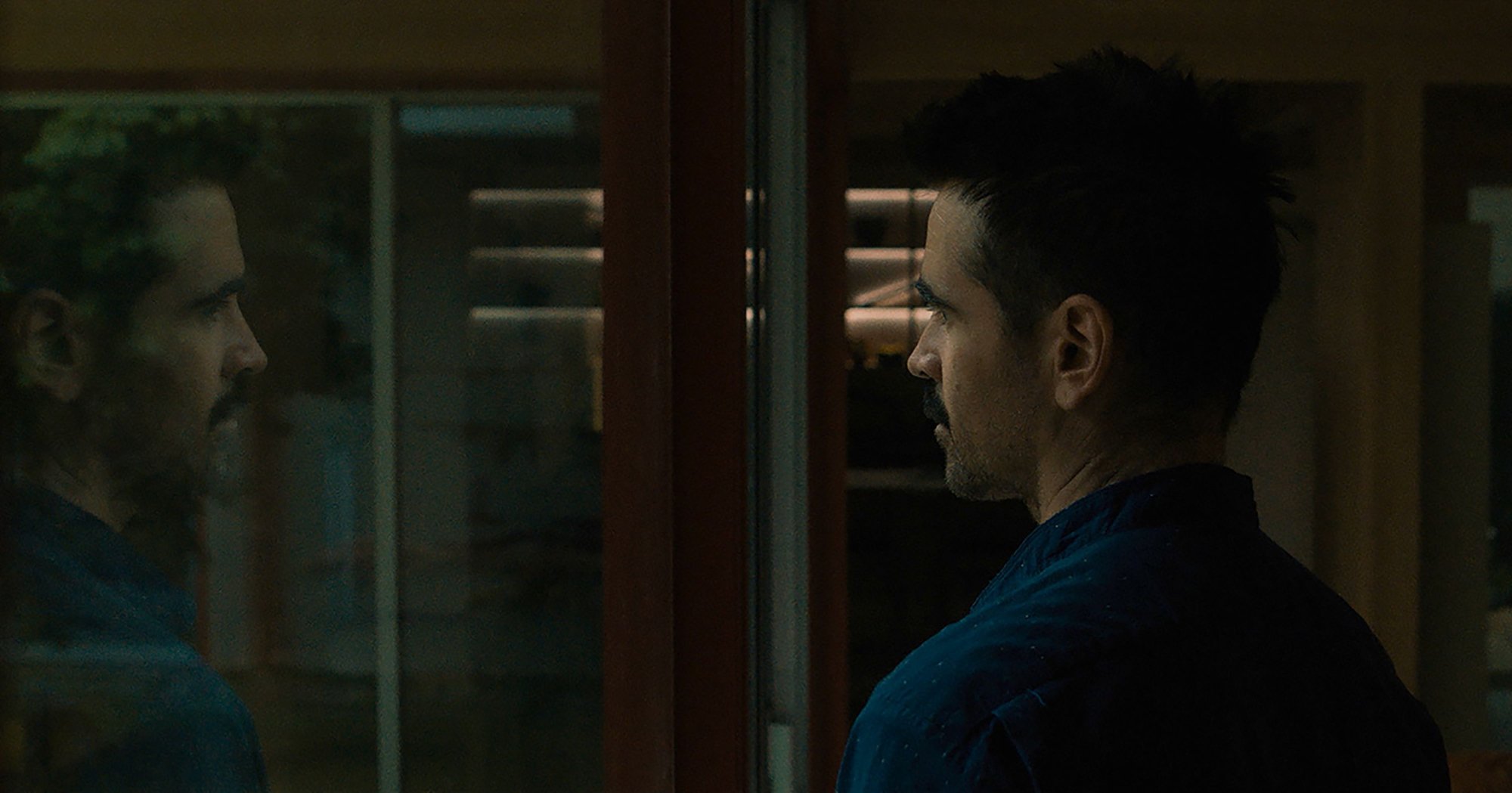 'After Yang' Colin Farrell as Jake looking out the window