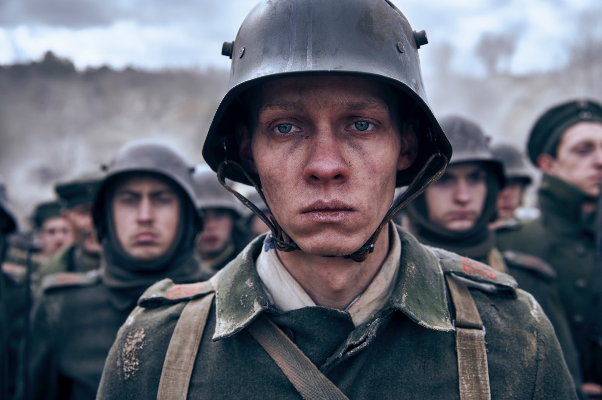 'All Quiet on the Western Front' Felix Kammerer as Paul Bäumer with a sad look on his face, looking straight ahead wearing his WWI uniform