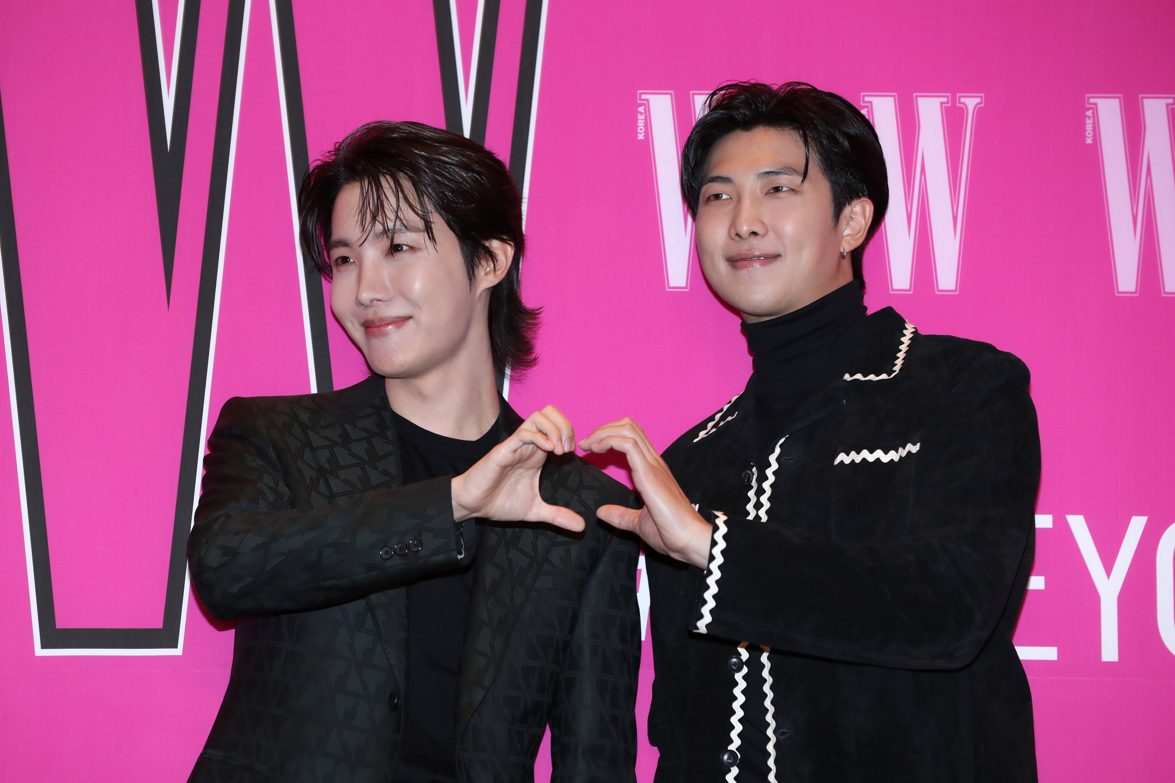 J-Hope and RM of BTS pose for photographs at the W Magazine Korea Breast Cancer Awareness Campaign 'Love Your W'