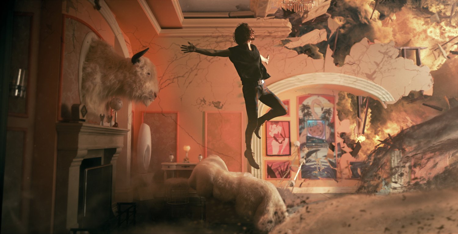'The Umbrella Academy' star Robert Sheehan as Klaus Hargreeves flies through the air in production still from one of the best streaming shows of 2022.