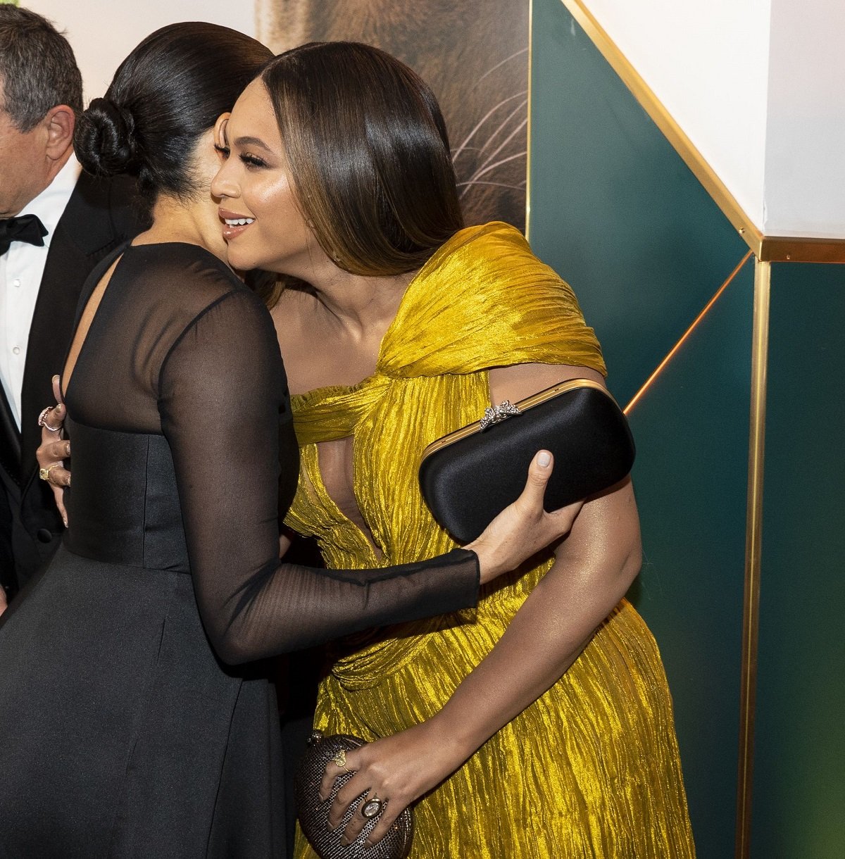 Beyonce greeting Meghan Markle at the European premiere of 'The Lion King'
