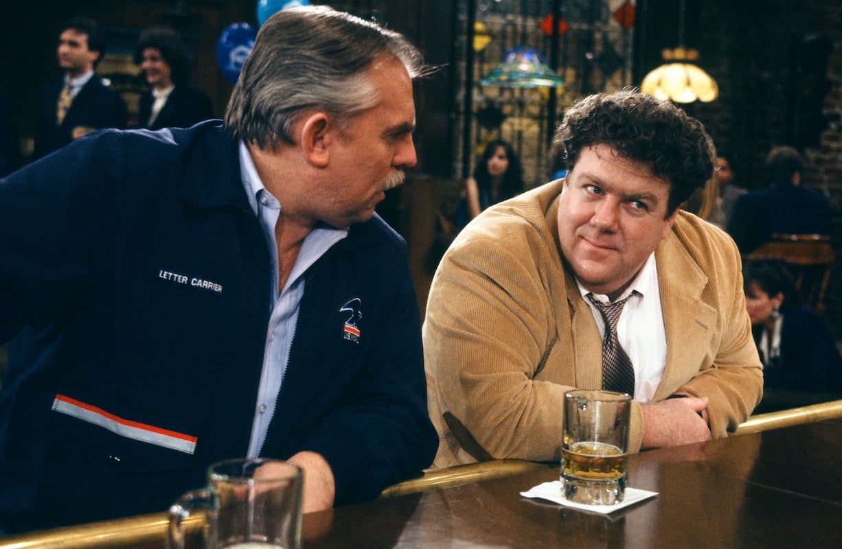 'Cheers': Norm (George Wendt) sits at the bar listening to Cliff (John Ratzenberger)'s story