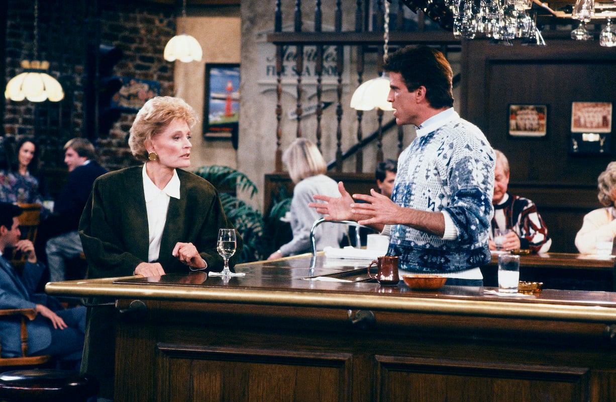 'Cheers': Sam Malone (Ted Danson) serves Alice Anne Volkman (Alexis Smith) at the bar