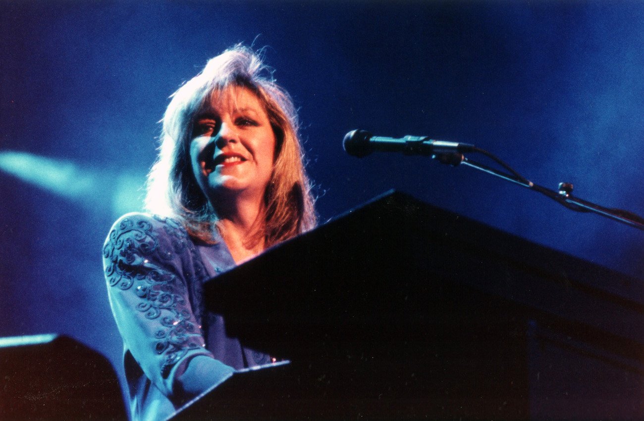 Christine McVie performing with Fleetwood Mac in 1990.