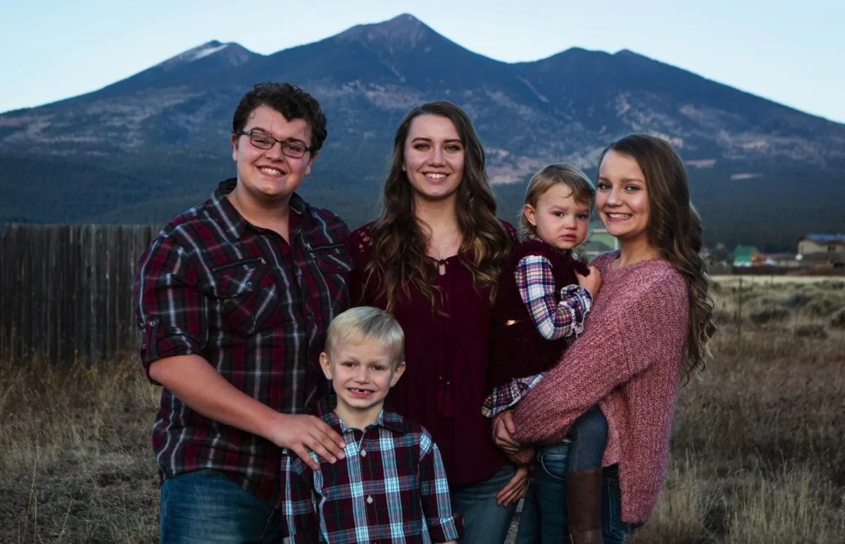 Dayton Brown, Solomon Brown, Aurora Brown, Ariella Brown and Breanna Brown pose for a photo on the family's Flagstaff Arizona property on 'Sister Wives'