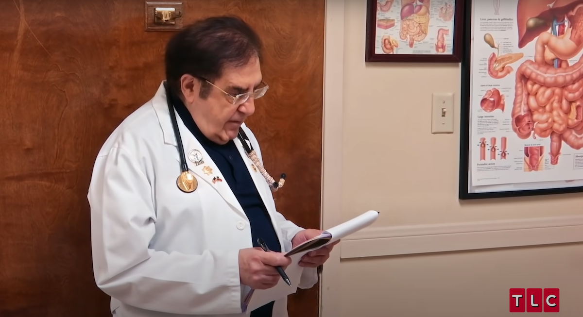 Dr. Now looking at a patient's chart on 'My 600-lb Life'