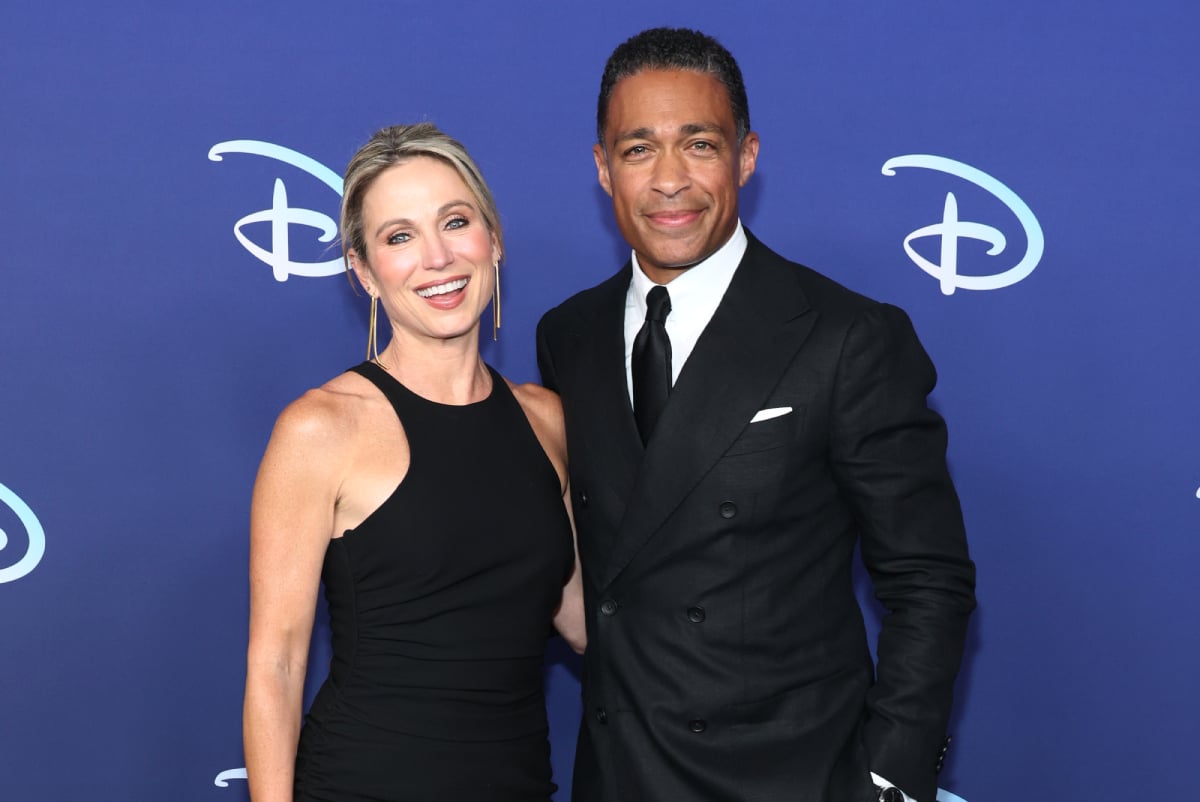 Amy Robach and TJ Holmes attend the 2022 ABC Disney Upfront at Basketball City - Pier 36 - South Street on May 17, 2022 in New York City