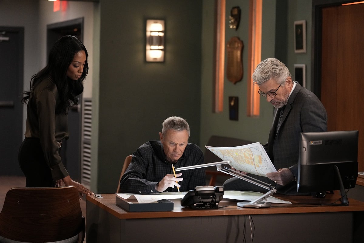 'General Hospital' stars Tanisha Harper, Tristan Rogers, and John J. York in a police station scene from the soap opera.