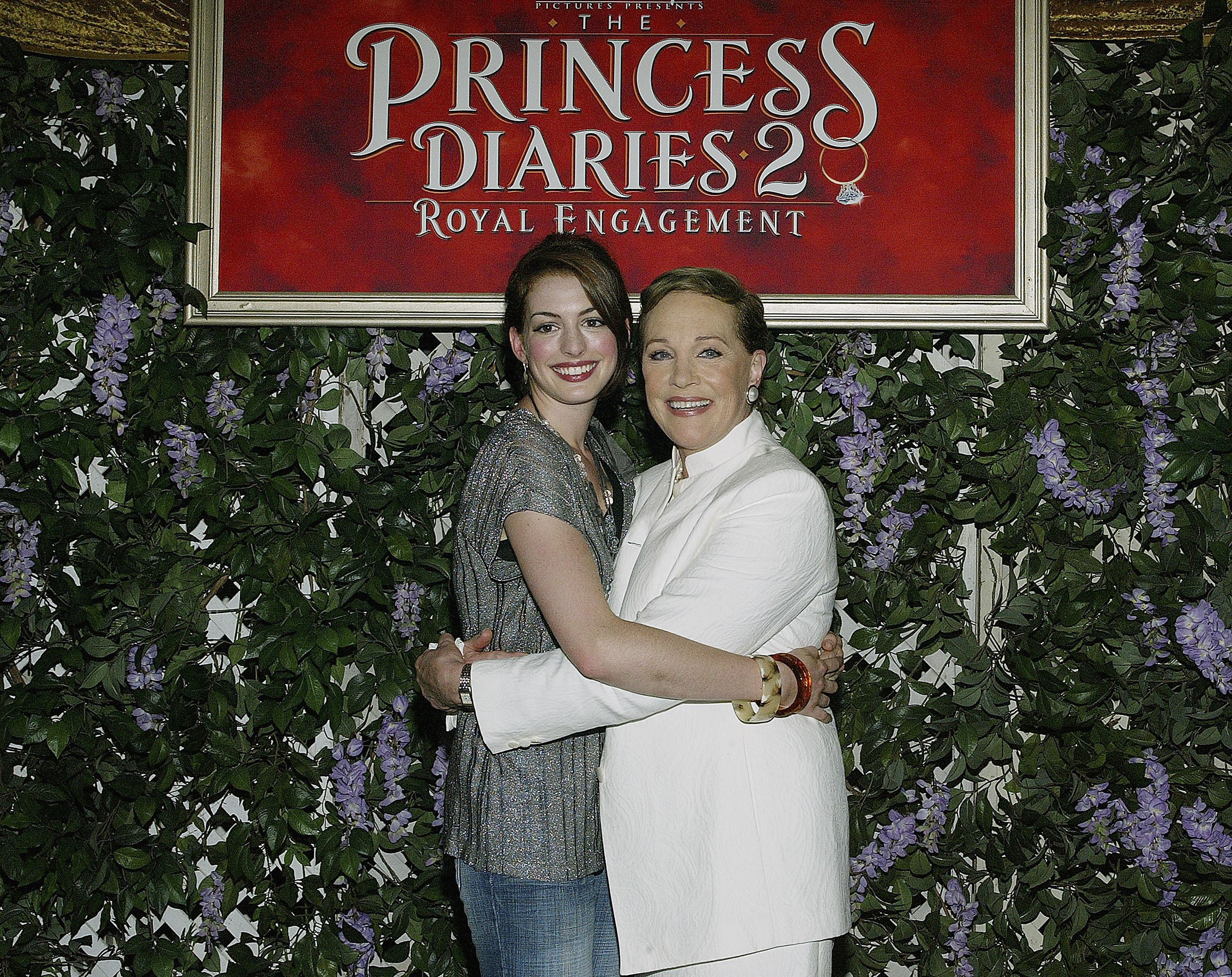 Anne Hathaway and Julie Andrews attend an event for Princess Diaries 2 in 2004.