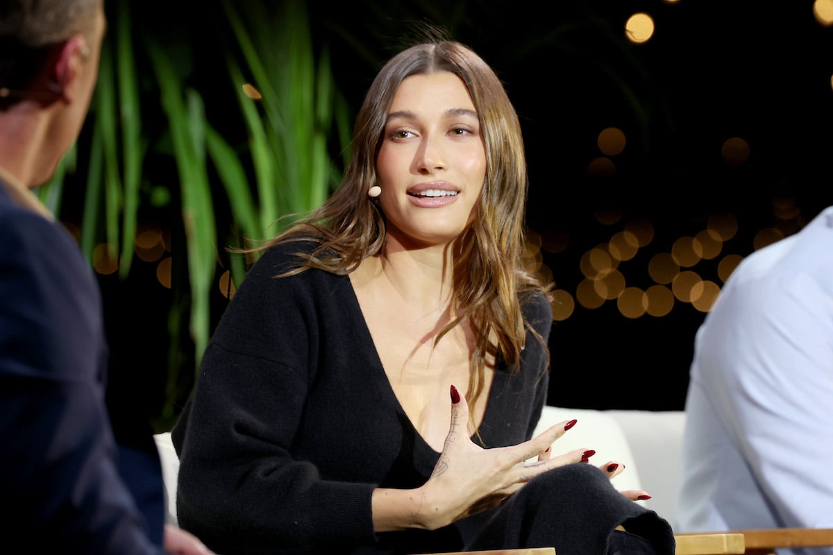 Hailey Bieber's Protective Body Positions During Her Bombshell 'Call Her  Daddy' Interview Reveal What's Really Going On, According to Body Language  Expert