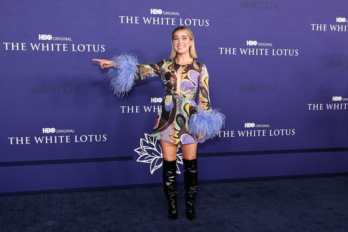 Haley Lu Richardson attends the LA Season 2 Premiere of HBO Original Series "The White Lotus" in a purple ostrich feather dress