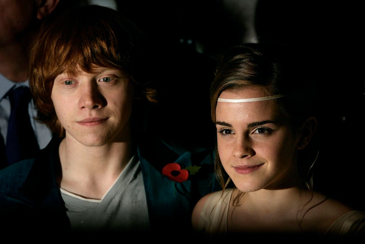 Harry Potter stars Rupert Grint and Emma Watson arrive at a premiere