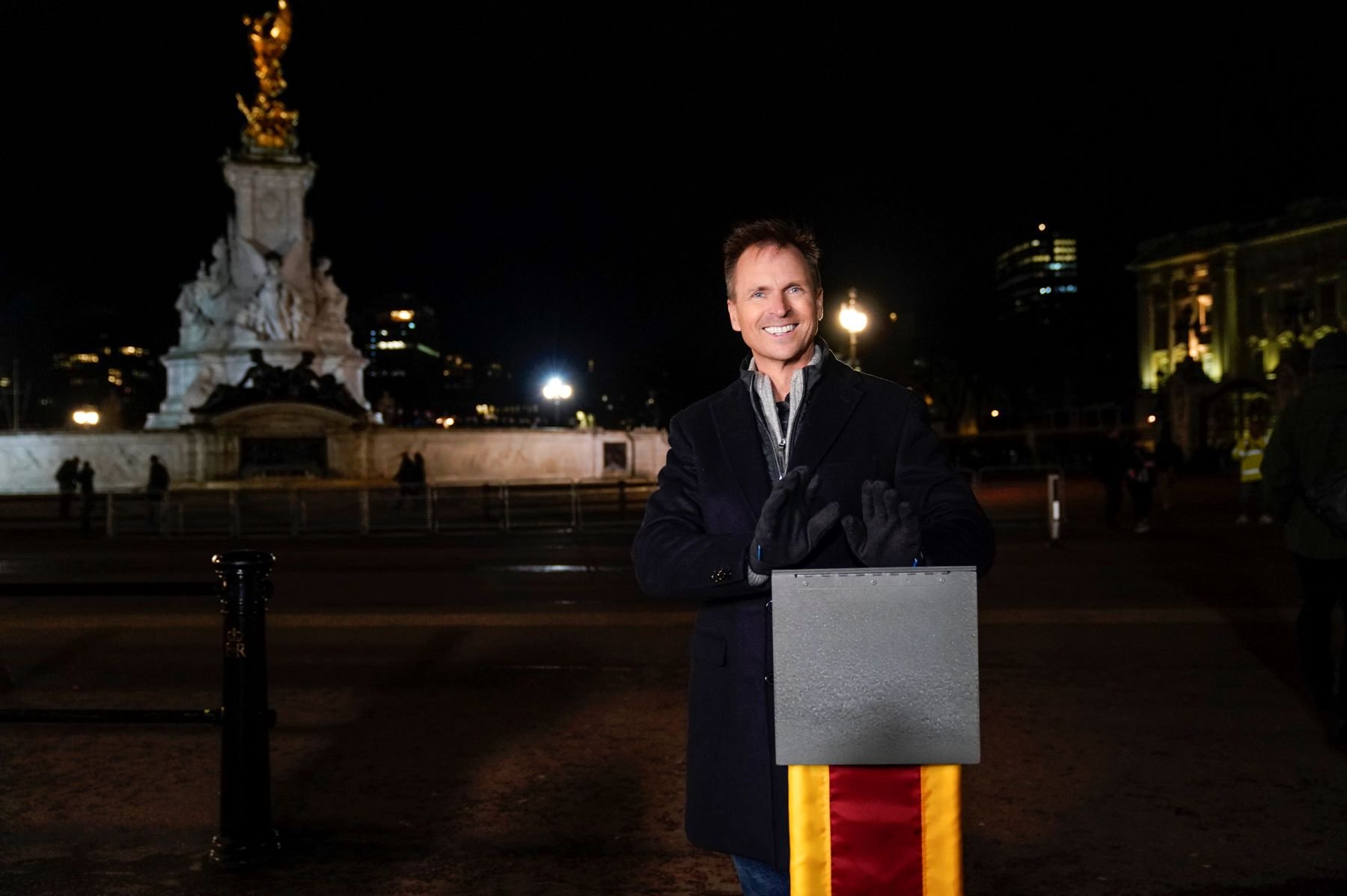 Phil Keoghan, the host of 'The Amazing Race' on CBS, wears a black coat