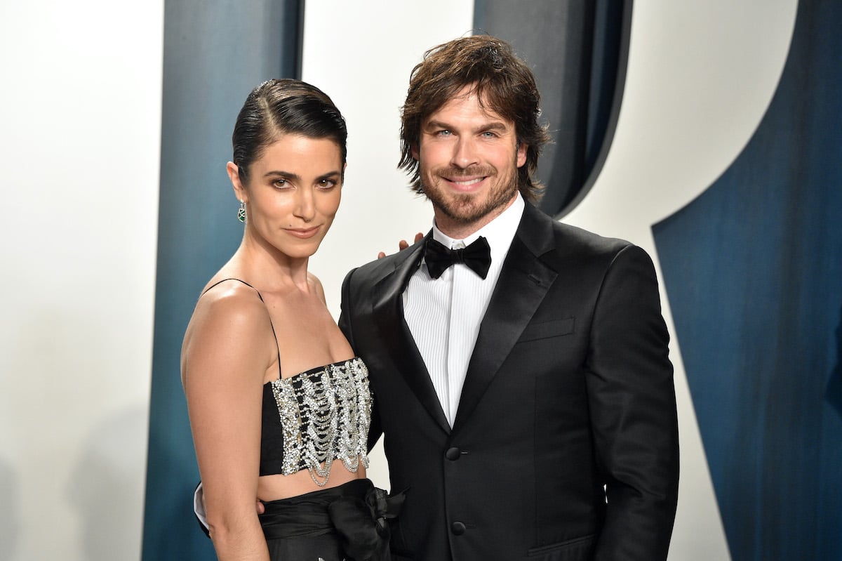 Ian Somerhalder (R) and Nikki Reed (L) smiling