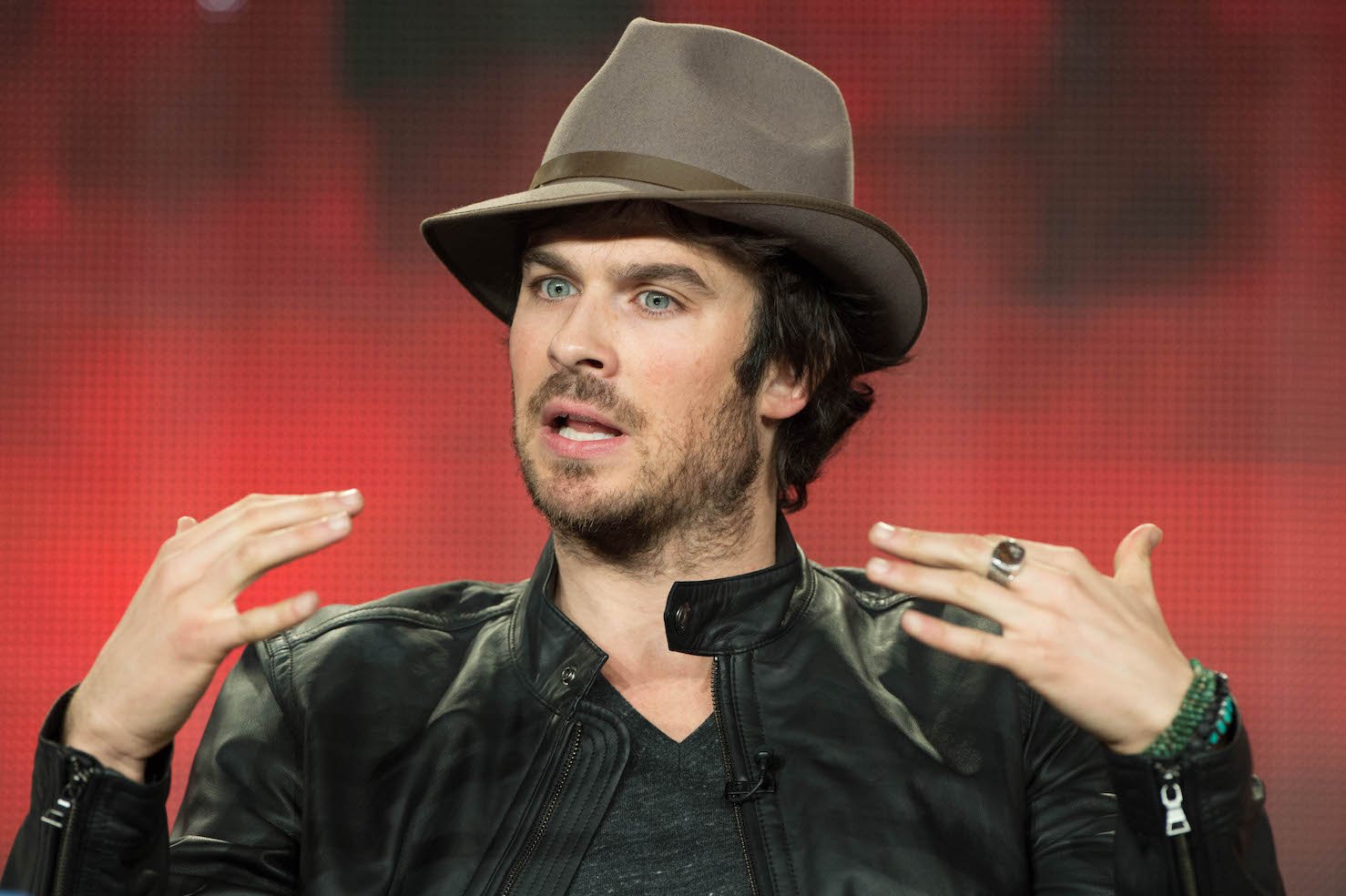 Ian Somerhalder of 'The Vampire Diaries' talking against a red background