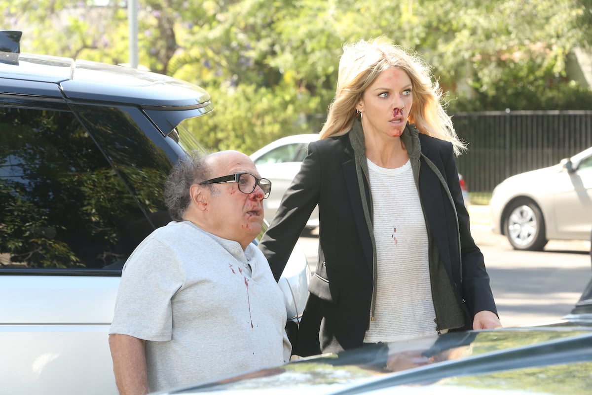 'It's Always Sunny in Philadelphia': Danny DeVito and Kaitlin Olson stand behind a car with bloody faces