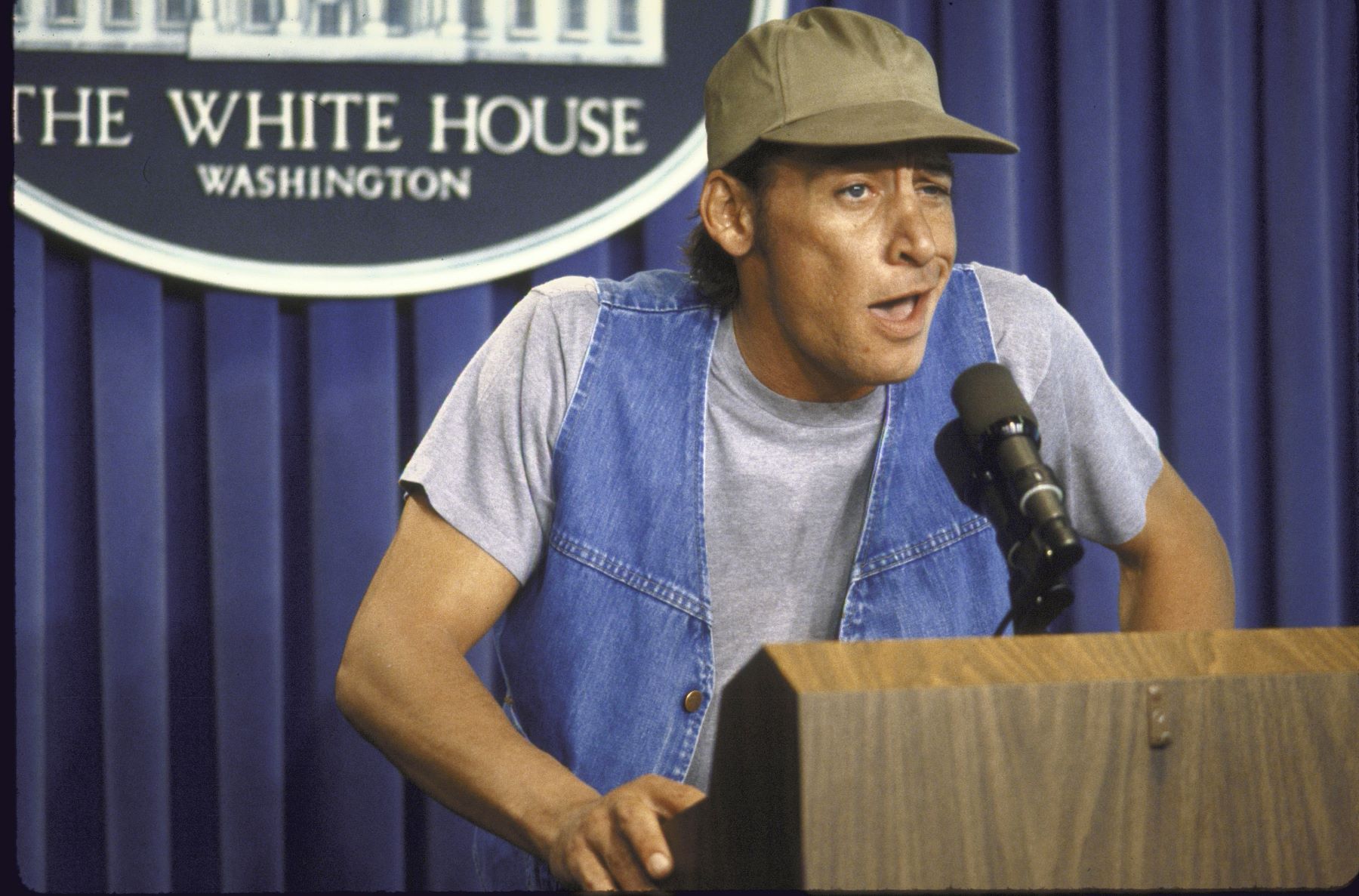 Comedian and actor Jim Varney as Ernest P. Worrell giving a briefing at the White House
