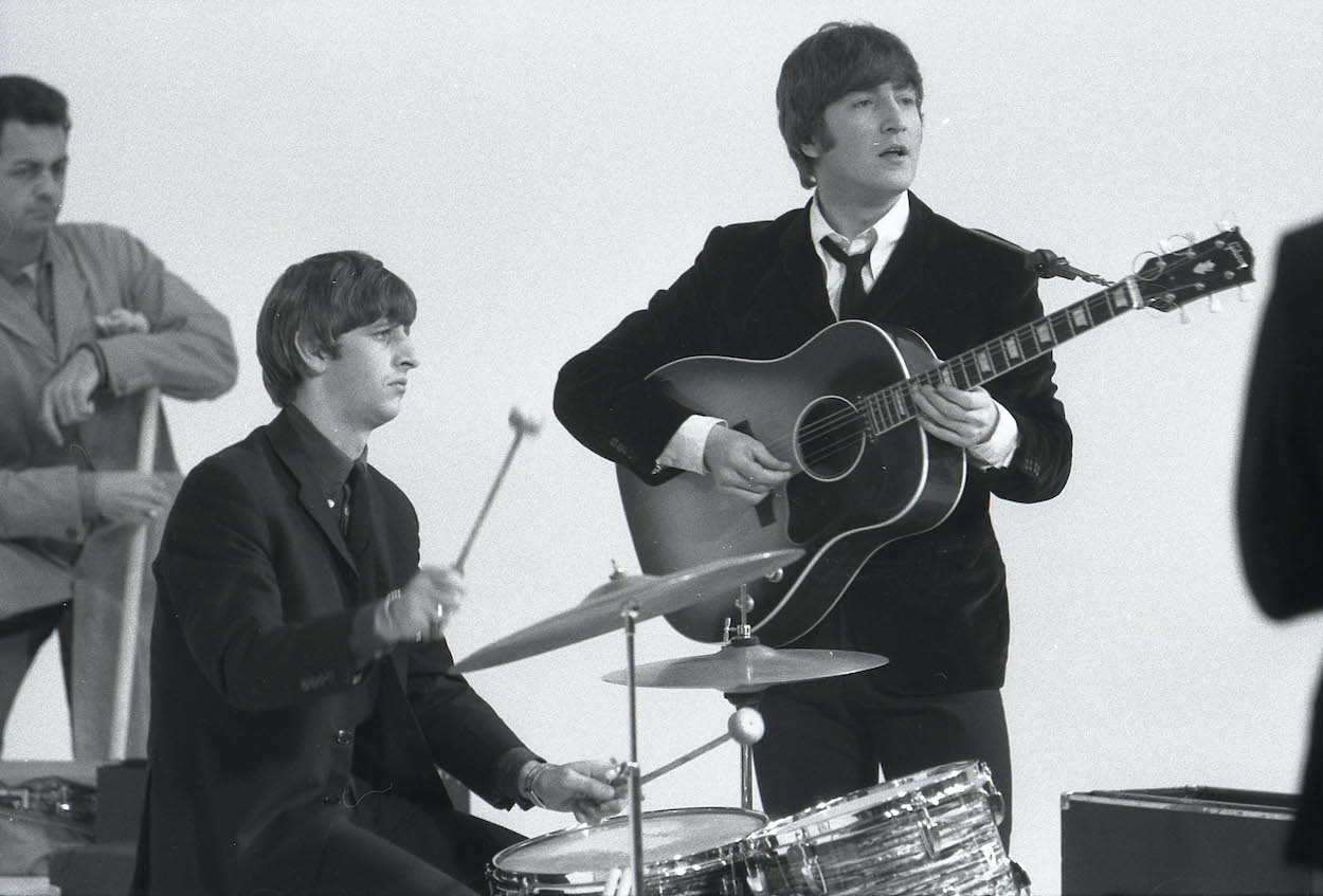 Ringo Starr (left) and John Lennon, who might have saved one of Ringo's relationships with four words, on the set of 'A Hard Day's Night' in 1964.