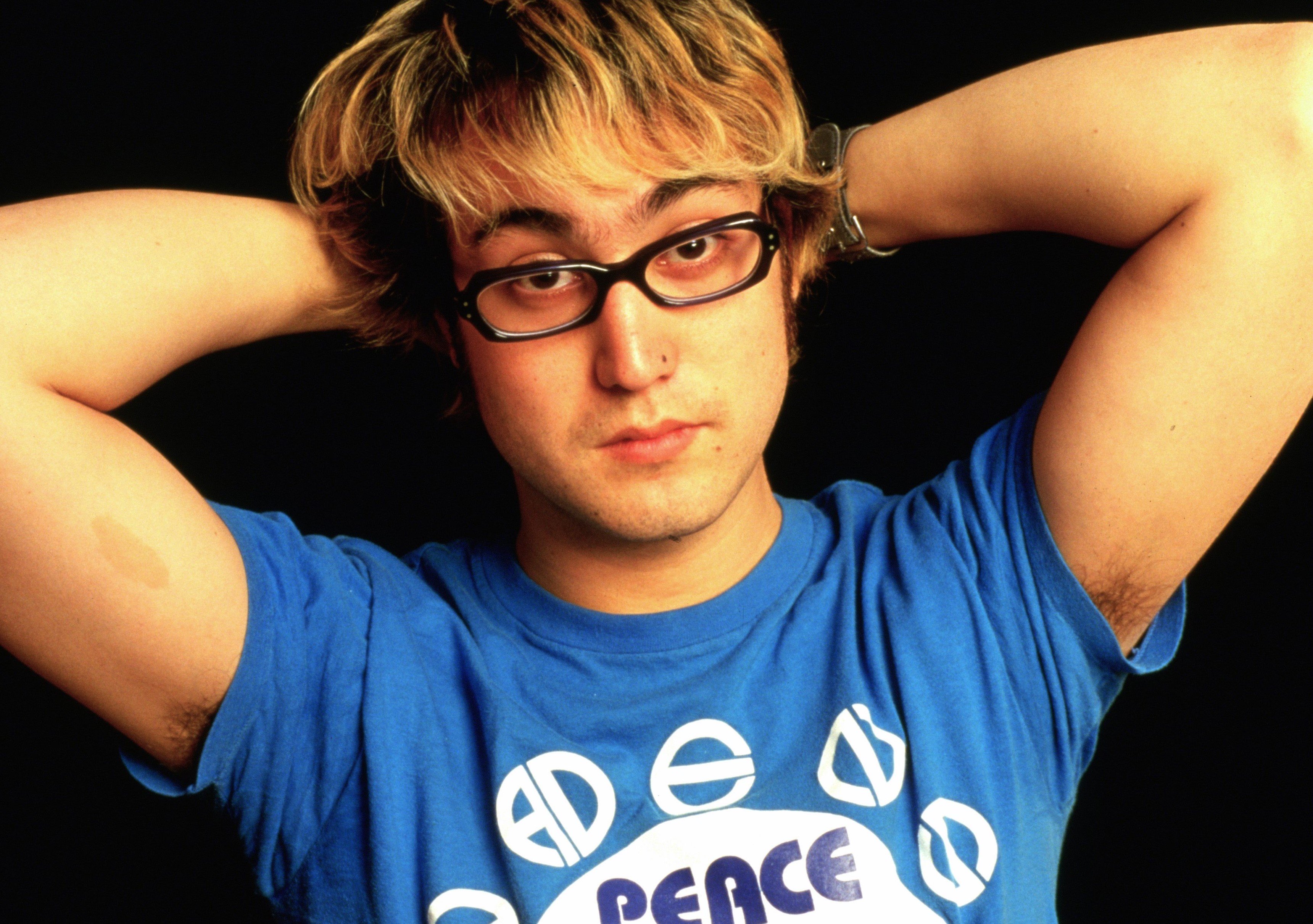 John Lennon's son, Sean Ono Lennon, wearing a blue shirt