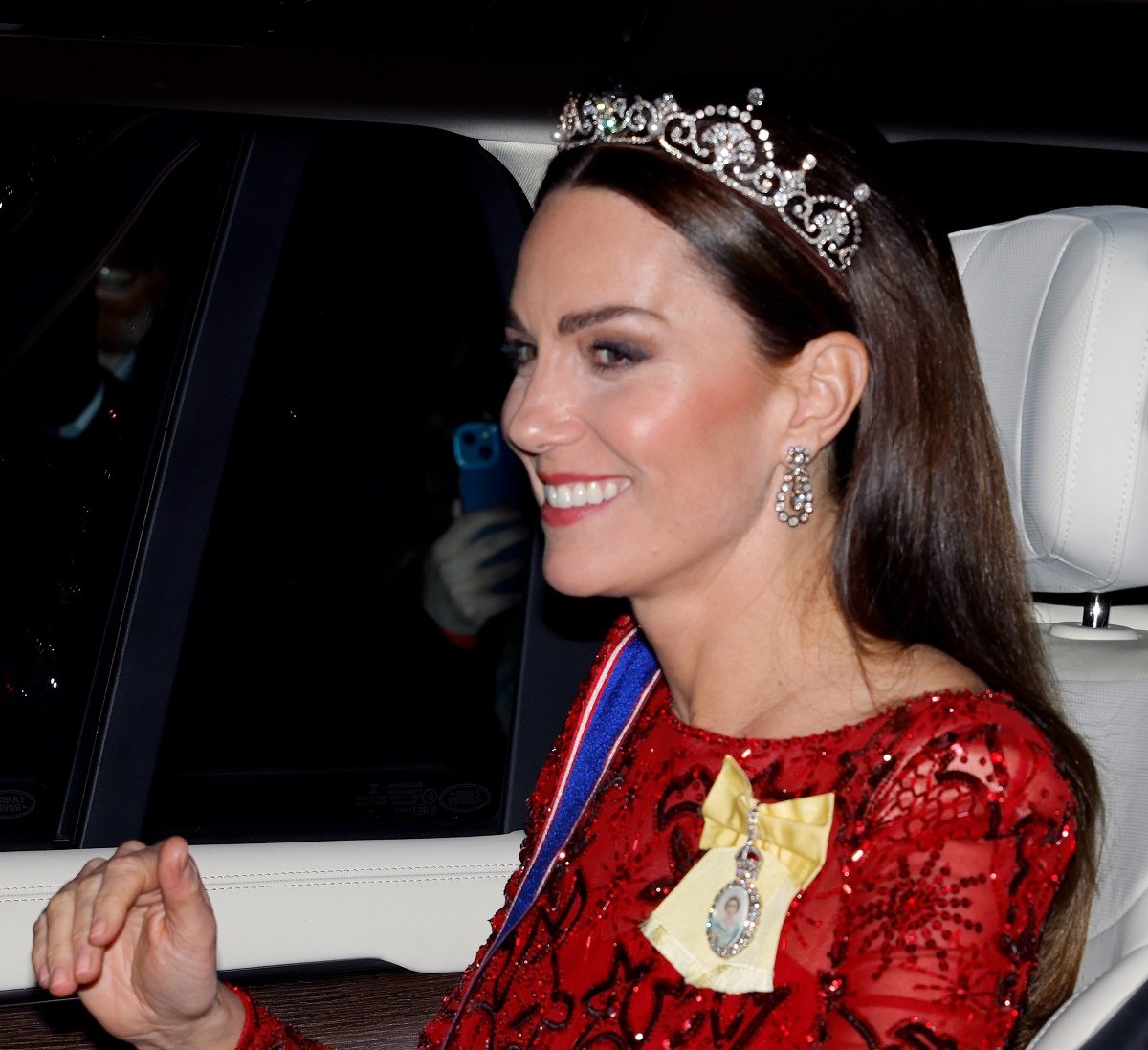 Kate Middleton wearing the Lotus Flower Tiara as she's being driven to the annual Reception for Members of the Diplomatic Corps at Buckingham Palace