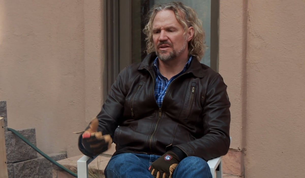 Kody Brown sitting outside in a season 17 episode of 'Sister Wives' on TLC.