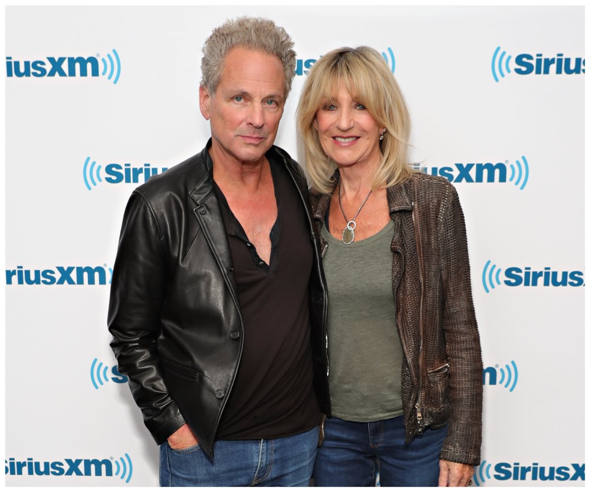 Lindsey Buckingham and Christine McVie pose together at an event.