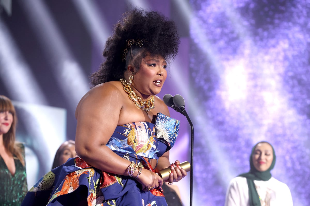 Honoree Lizzo accepts The People's Champion award on stage during the 2022 People's Choice Awards