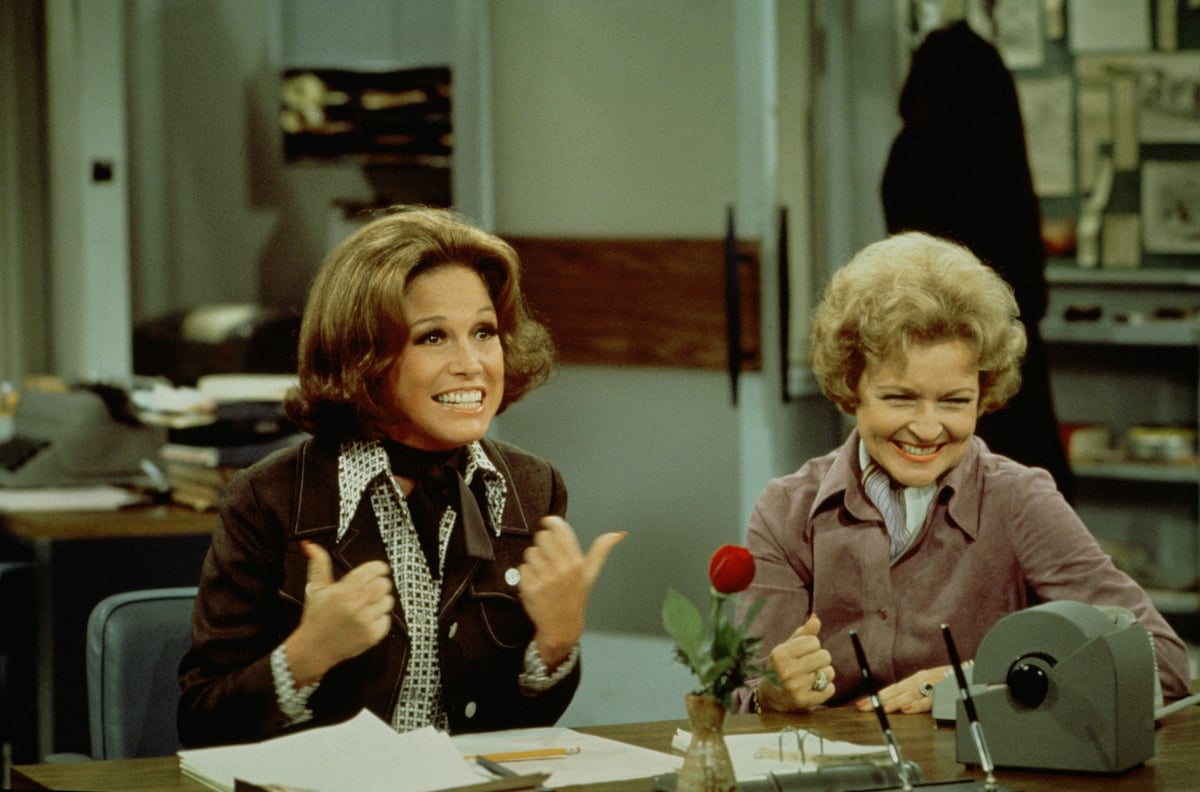 'The Mary Tyler Moore Show' actors Mary Tyler Moore as Mary Richards, and Betty White as Sue Ann Nivens laughing