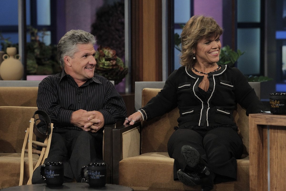 Matt Roloff and Amy Roloff from 'Little People, Big World' sitting next to each other on a talk show