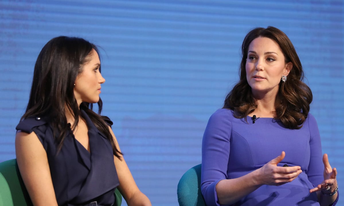 Meghan Markle and Kate Middleton, who had a 'playful' reaction to a funny moment at the 2018 Royal Foundation Forum while Meghan Markle reacted with 'discomfort,' according to a body language expert, sit onstage